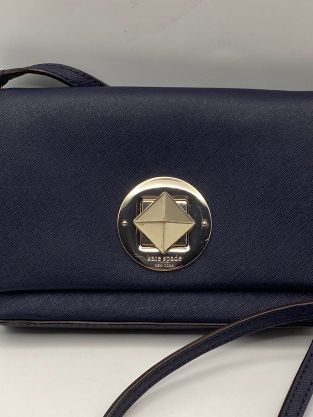 Kate Spade Navy Saffiano Leather Crossbody Bag with turn lock